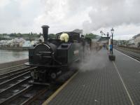 <h4><a href='/locations/P/Porthmadog_Harbour_FR'>Porthmadog Harbour [FR]</a></h4><p><small><a href='/companies/F/Festiniog_Railway'>Festiniog Railway</a></small></p><p>'Fairlie' locomotive 'Earl Meirionnydd', dating from 1979, waiting to depart from Porthmadog Harbour station with a Ffestiniog Railway train to Blaenau Ffestiniog on 22nd May 2016.   The first double-bogied articulated steam locomotives, known as 'Fairlies' after their designer, Robert Francis Fairlie (1831-1885) were introduced to the Ffestiniog Railway in 1869.   Constructed with swivelling power bogies, they enable longer trains to be hauled without increasing manpower costs and have long boilers with tall chimneys at both ends, giving them a very striking appearance.   The FR is still building 'Fairlies' today and some can now be seen working as far afield as Australia and USA.   This photo was taken while I was waiting to have my first ever ride on the Welsh Highland Railway to Caernarfon; I travelled on the FR to Blaenau Ffestiniog the following day. 1/14</p><p>22/05/2016<br><small><a href='/contributors/David_Bosher'>David Bosher</a></small></p>