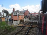 <h4><a href='/locations/C/Crediton'>Crediton</a></h4><p><small><a href='/companies/E/Exeter_and_Crediton_Railway'>Exeter and Crediton Railway</a></small></p><p>A look back at Crediton signal box, level crossing and station from UK Railtours' excursion to Barnstaple, with coaches providing onward transport to Woody Bay for the short revived section of the narrow gauge Lynton & Barnstaple Railway, on 17th April 2016. 6/23</p><p>17/04/2016<br><small><a href='/contributors/David_Bosher'>David Bosher</a></small></p>