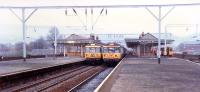 Three trains in Dumbarton Central.<br><br>[Ewan Crawford //1988]