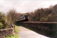 Newcastle bound Sprinter runs east towards Border Counties Junction.<br><br>[Ewan Crawford /11/1997]