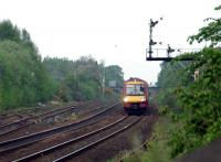 The last splitting distant in Britain. A Glasgow train southbound approaching Larbert.<br><br>[Ewan Crawford 12/05/2006]
