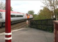 A diverted Pendolino being dragged south through Lazonby station on the Settle and Carlisle line by a Virgin class 57 <I>Thunderbird</I> locomotive on Saturday 6 May 2006.<br><br>[John Furnevel 06/05/2006]