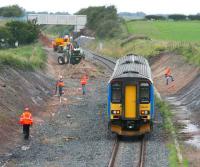 Carlisle - Glasgow service (in Central Trains livery) being waved through the widening works north of Gretna Green station on 3 August 2007.<br><br>[John Furnevel 03/08/2007]
