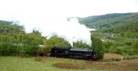 Steam train for Fort William passing the head of the Gare Loch.<br><br>[Ewan Crawford 25/05/2006]