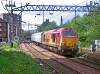 67011 passes Dalmuir on a crew-training run. May 19, 2006<br><br>[Andy Kirkham 25/05/2006]