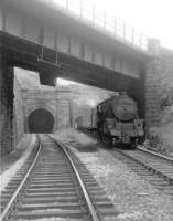 Black 5 44850 leaving Cartsburn Tunnel with a Wemyss Bay to Glasgow Central train in August 1963. The locomotive is about to pass below the bridge carrying the line to Princes Pier. [See image 51451]<br><br>[John Robin 13/08/1963]