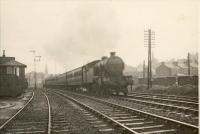 Edinburgh via Dunfermline train leaving Stirling. V3 2.6.2T 67669. Stirling visit 26.8.50.<br><br>[G H Robin collection by courtesy of the Mitchell Library, Glasgow 26/08/1950]