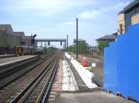 Looking west from Haymarket platform 1 on 8 June 2006 with work in progress on the run-in to the new platform 0 which will take over part of the station car park (makes a nice change) behind the blue barrier.<br><br>[John Furnevel 08/06/2006]