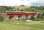 <h4><a href='/locations/J/Jamestown_Viaduct_Inverkeithing'>Jamestown Viaduct [Inverkeithing]</a></h4><p><small><a href='/companies/F/Forth_Bridge_Railway'>Forth Bridge Railway</a></small></p><p>Coal train running onto Jamestown Viaduct on the approach to Inverkeithing in June 2006. In the background is the M90 Motorway and cars parked in the <I>Ferry Toll Park and Ride</I> facility can be seen below the viaduct. On the hill above stands part of the former MoD Pitreavie Maritime HQ (the main underground facility having been closed down and sealed in 1995.)    13/14</p><p>20/06/2006<br><small><a href='/contributors/John_Furnevel'>John Furnevel</a></small></p>