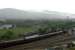 Mallaig-Fort William sprinter passing the empty stock of the Jacobite.<br><br>[Ewan Crawford 28/05/2006]