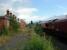 Stand-off at Aberdare High Level ... the coal train serves the loading facility for the Tower Colliery near Hirwaun and the Sprinter is terminating on a local service from Cardiff.<br><br>[Ewan Crawford 06/07/2006]